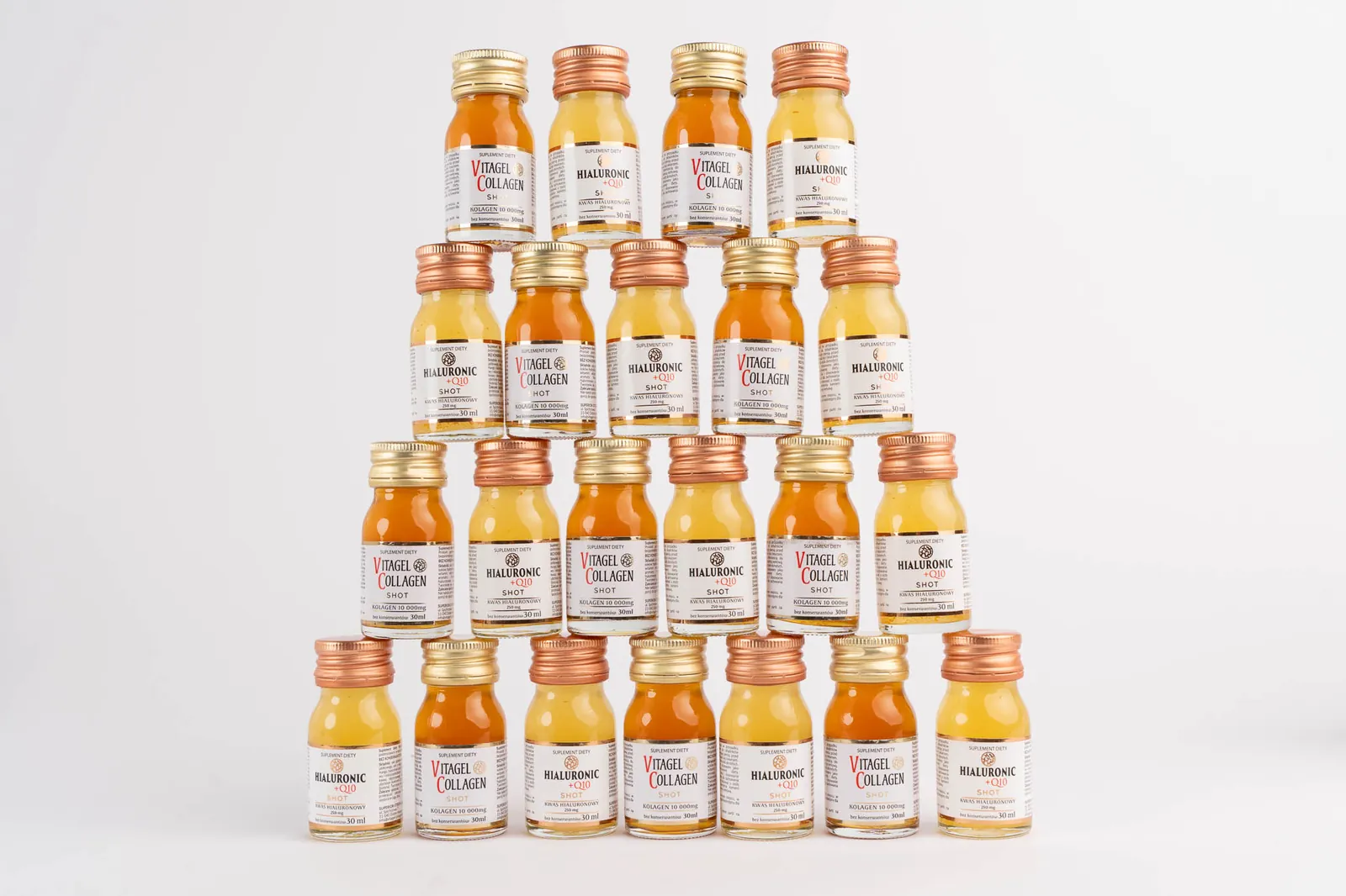 Packshot butelek suplementów na białym tle — fotografia produktowa dla e-commerce